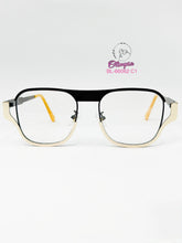 Cargar imagen en el visor de la galería, <div  title='Genero  | Forma UNISEX RECTANGULAR | Color  AMARILLO DORADO | NEGRO | COMPLETOmmANCHOTOTAL | 142mmANCHODELENTE | 50mmALTURADELENTE | 16mmPUENTE | 140m' > BL-66062 C1 </div>
